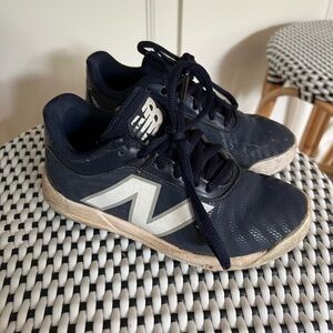 New Balance Kids' Dark Blue baseball cleats 12.5W